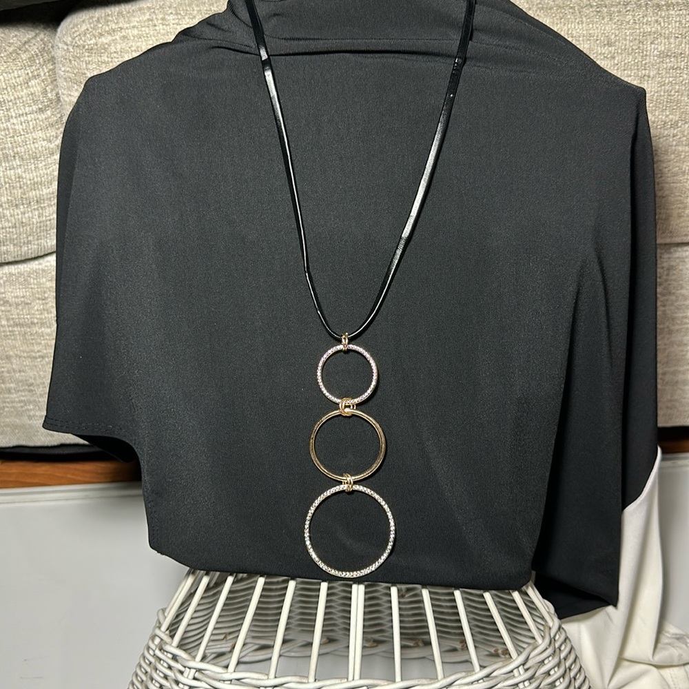 Black faux leather necklace w/ gold bling circles & stud bling earrings.